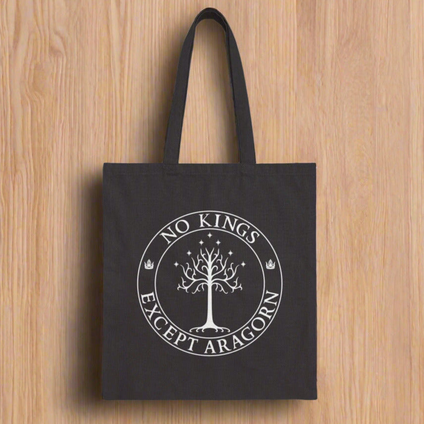 A black tote back with the text "No kings except Aragorn" and a graphic f a tree with seven stars above it and two crowns of the king of Gondor.
