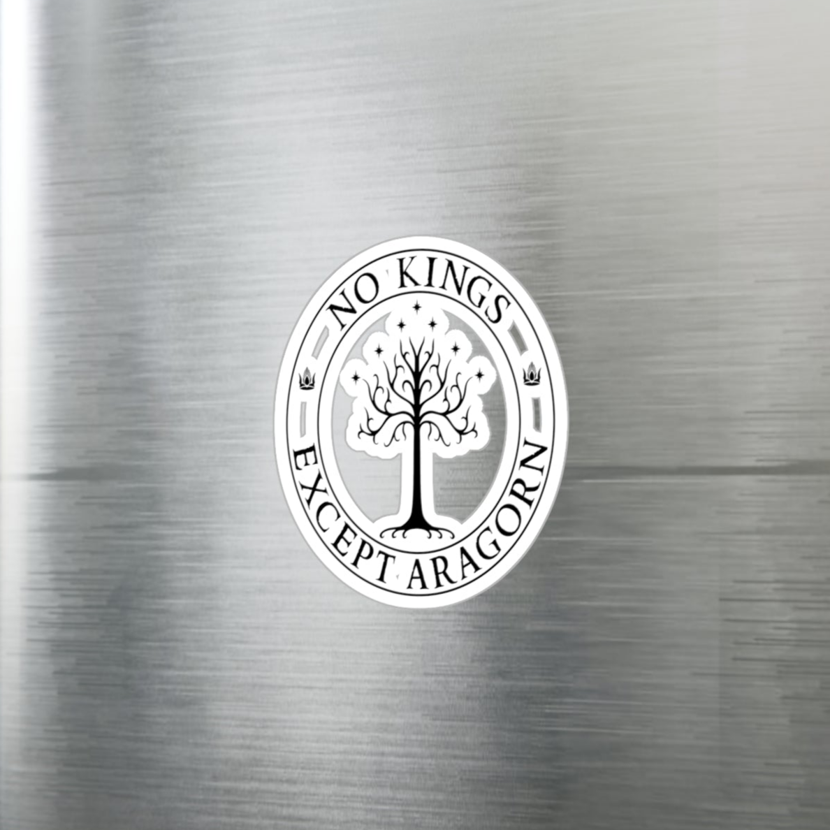 Circular sticker with the text "No kings except Aragorn" and a graphic of a white tree with seven stars above it and the crown of the king of Gondor.