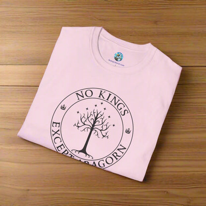 A pink t-shirt with text that says "No kings except Aragorn" and a graphic of a tree with seven stars above it and two crowns of the king of Gondor.