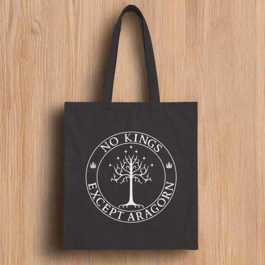 A black tote back with the text "No kings except Aragorn" and a graphic f a tree with seven stars above it and two crowns of the king of Gondor.