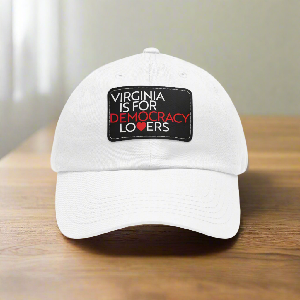 White cap with a black patch reading 'Virginia is for Democracy Lovers' on a white background
