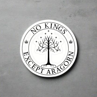 Circular sticker with the text "No kings except Aragorn" and a graphic of a white tree with seven stars above it and the crown of the king of Gondor.