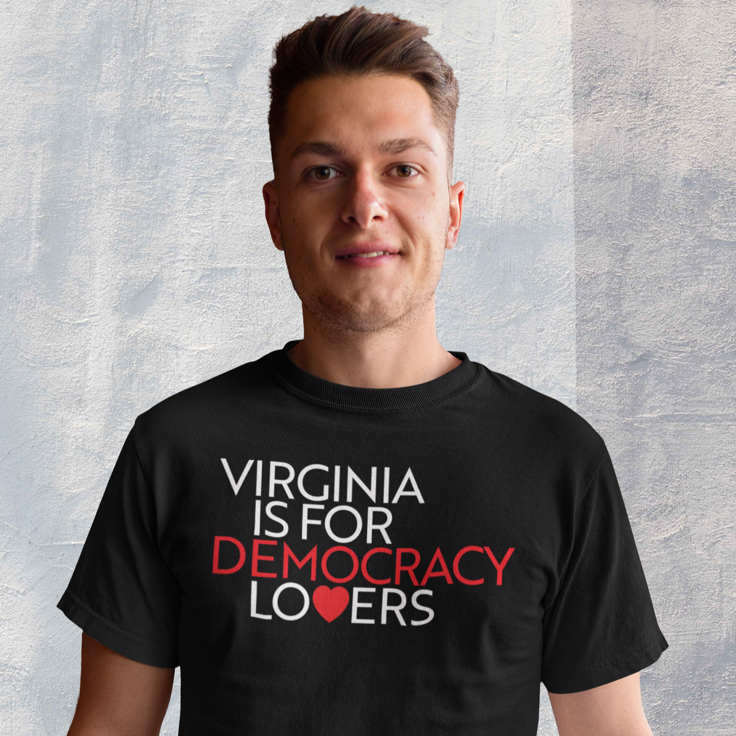 Person wearing a black t-shirt with 'Virginia is for Democracy Lovers' text